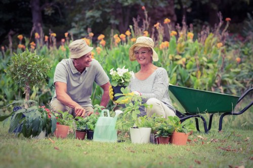 Trained landscaper using proper safety equipment on site
