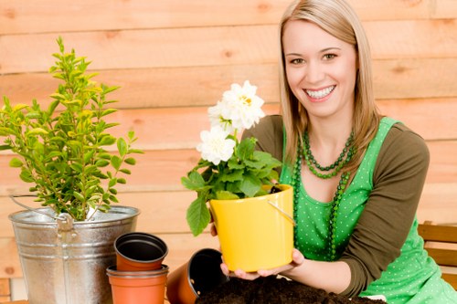Charitable reuse of surplus landscaping materials and plants